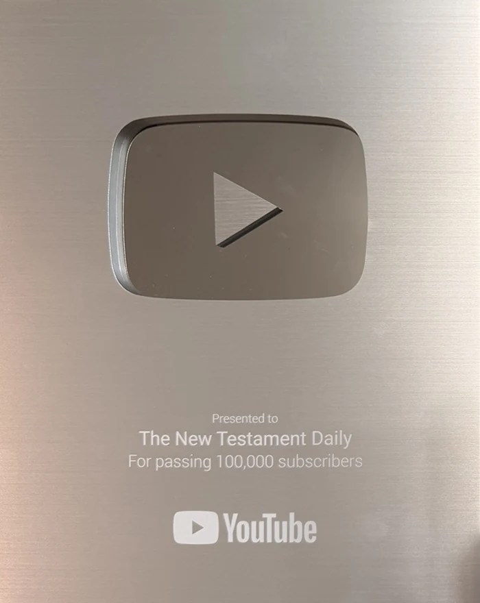 The YouTube Silver Creator Award plaque, presented to The New Testament Daily for passing 100,000 subscribers
